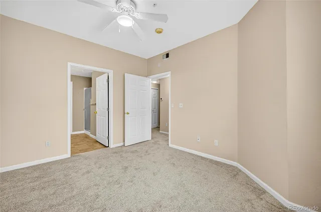 a bathroom with a sink a toilet and a shower