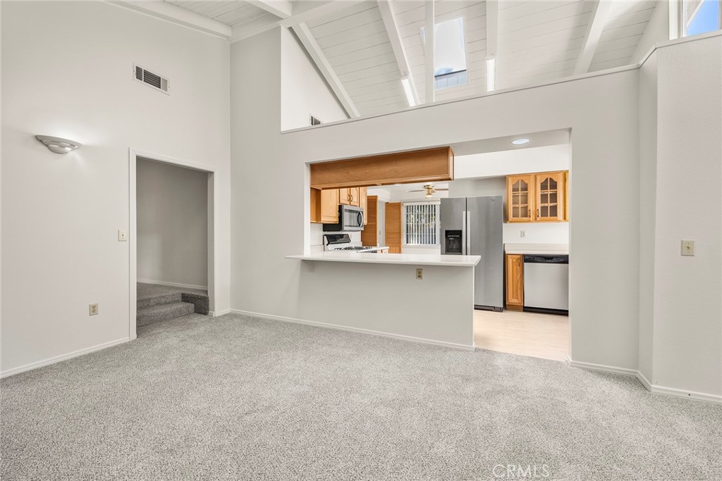 4821 Hampton Road La Canada Flintridge, CA 91011 - Photo 12 of 36 an empty room with a fireplace and cabinet
