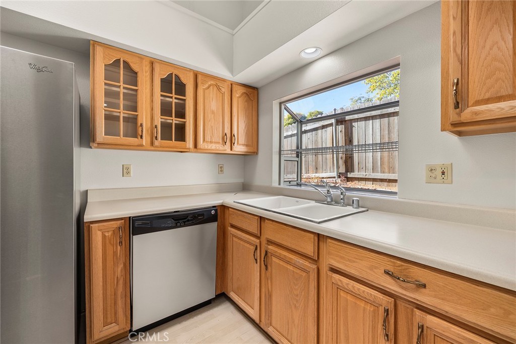 4821 Hampton Road La Canada Flintridge, CA 91011 - Photo 16 of 36 a kitchen with a sink cabinets and window