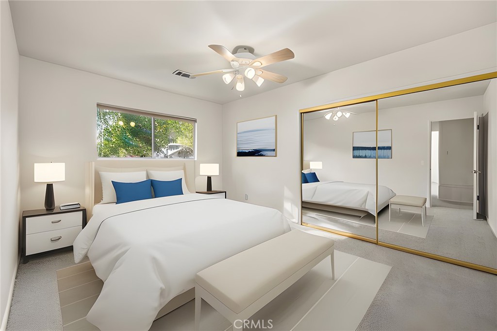 4821 Hampton Road La Canada Flintridge, CA 91011 - Photo 24 of 36 a bedroom with a large bed and a chandelier