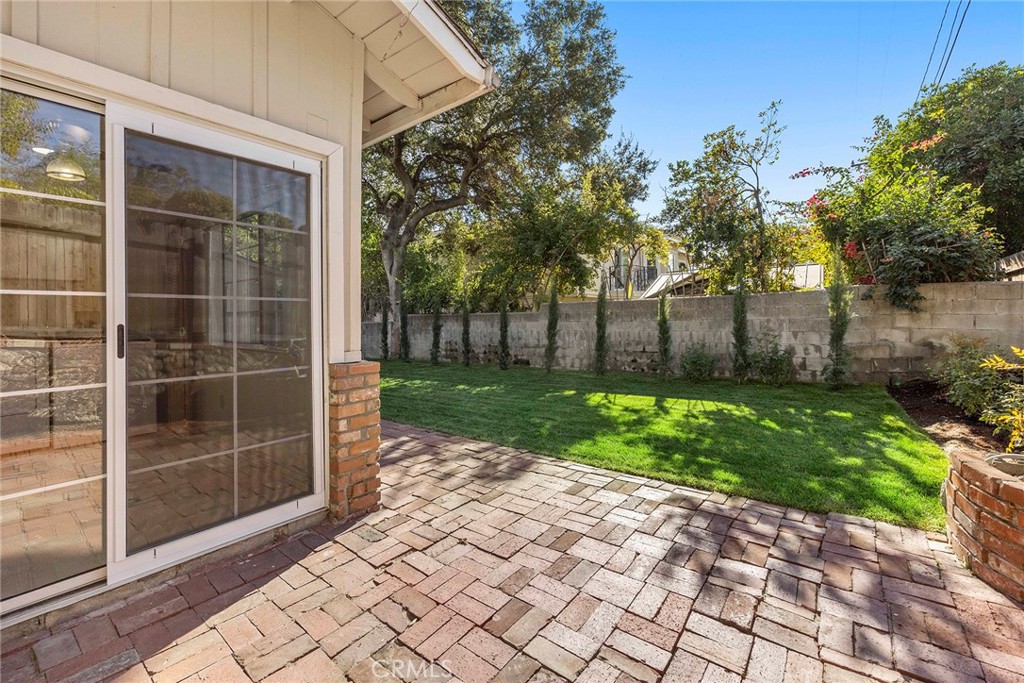 4821 Hampton Road La Canada Flintridge, CA 91011 - Photo 35 of 36 a view of backyard with potted plants and a large tree