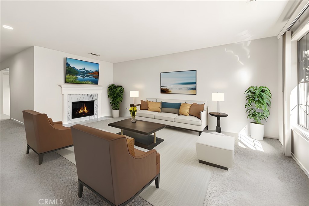 4821 Hampton Road La Canada Flintridge, CA 91011 - Photo 4 of 36 a living room with furniture a flat screen tv and a fireplace