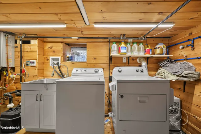 a view of house with outdoor space and sitting area