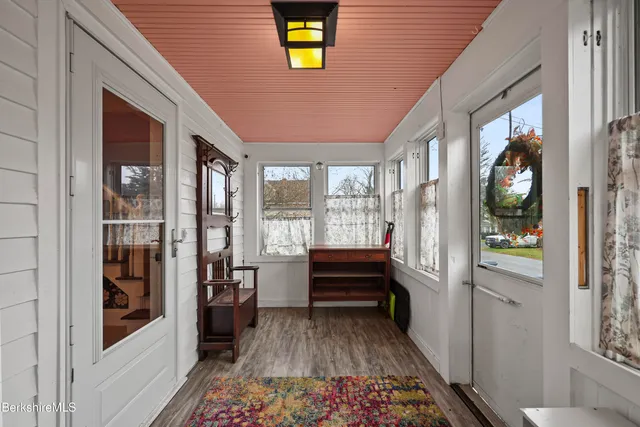 a room with furniture and a window