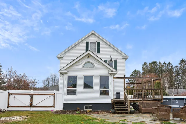 a house view with a garden space