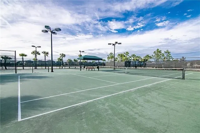 a view of a yard with a house