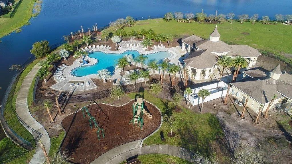 10019 Newminster Loop Ruskin, FL 33573 - Photo 34 of 34 an aerial view of a swimming pool and outdoor space
