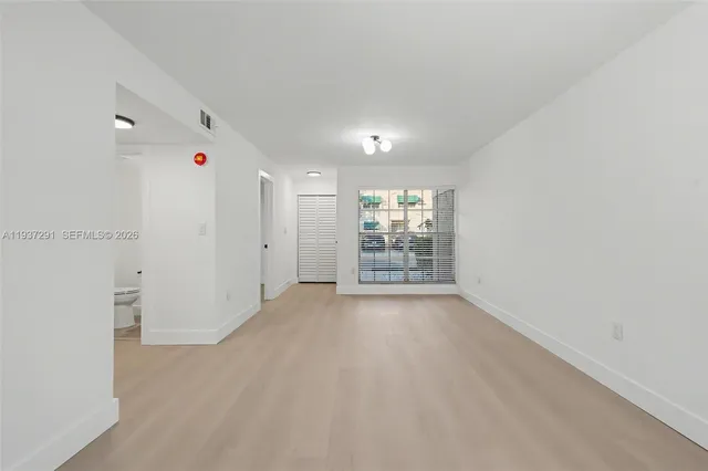 an empty room with windows