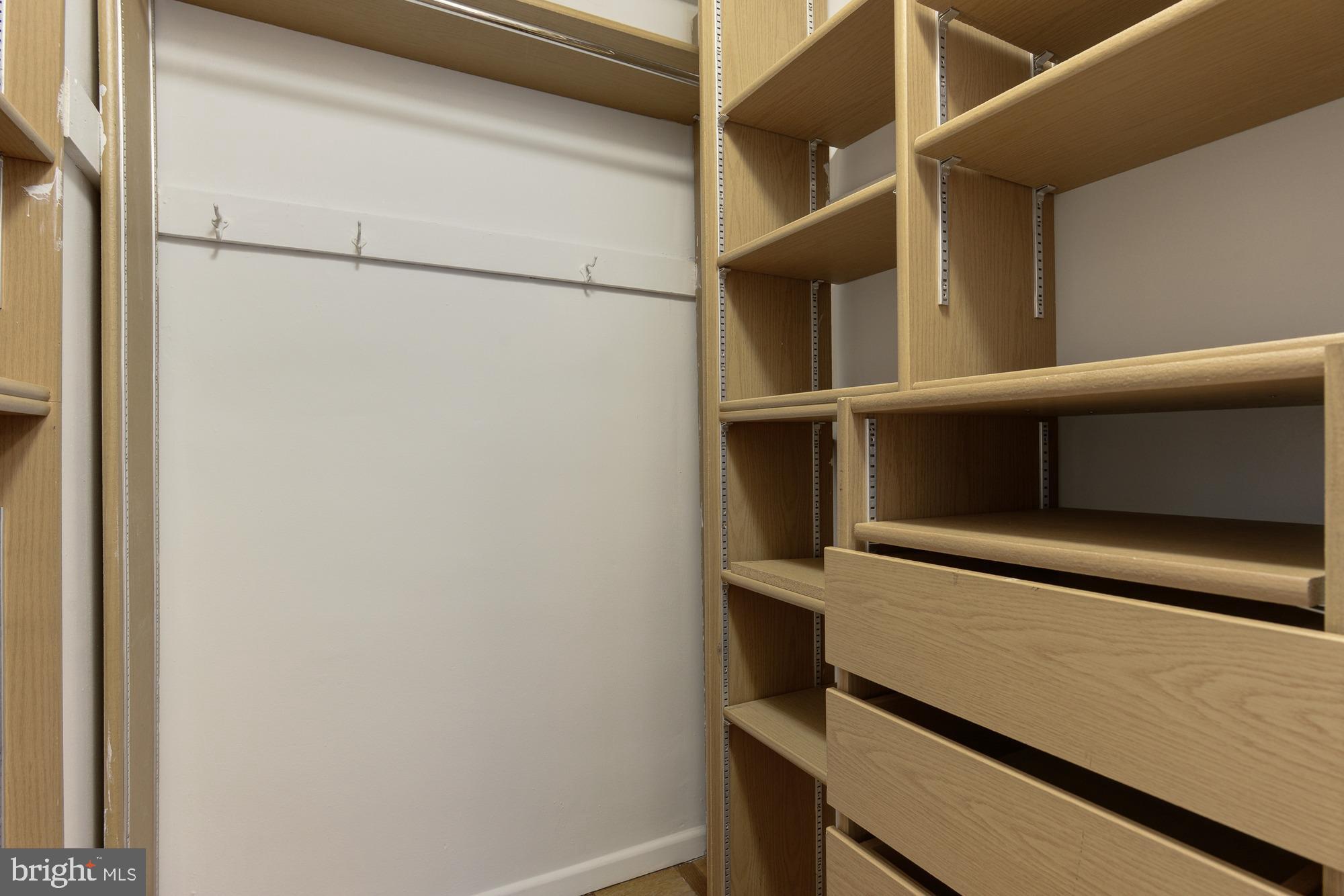 4100 W Street Northwest, Unit 416 Washington, DC 20007 - Photo 17 of 32 a view of storage and utility room with racks on the wall