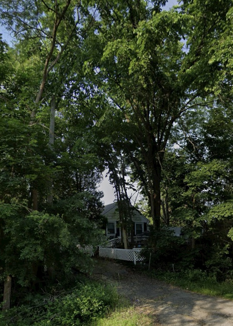a view of swimming pool with a patio