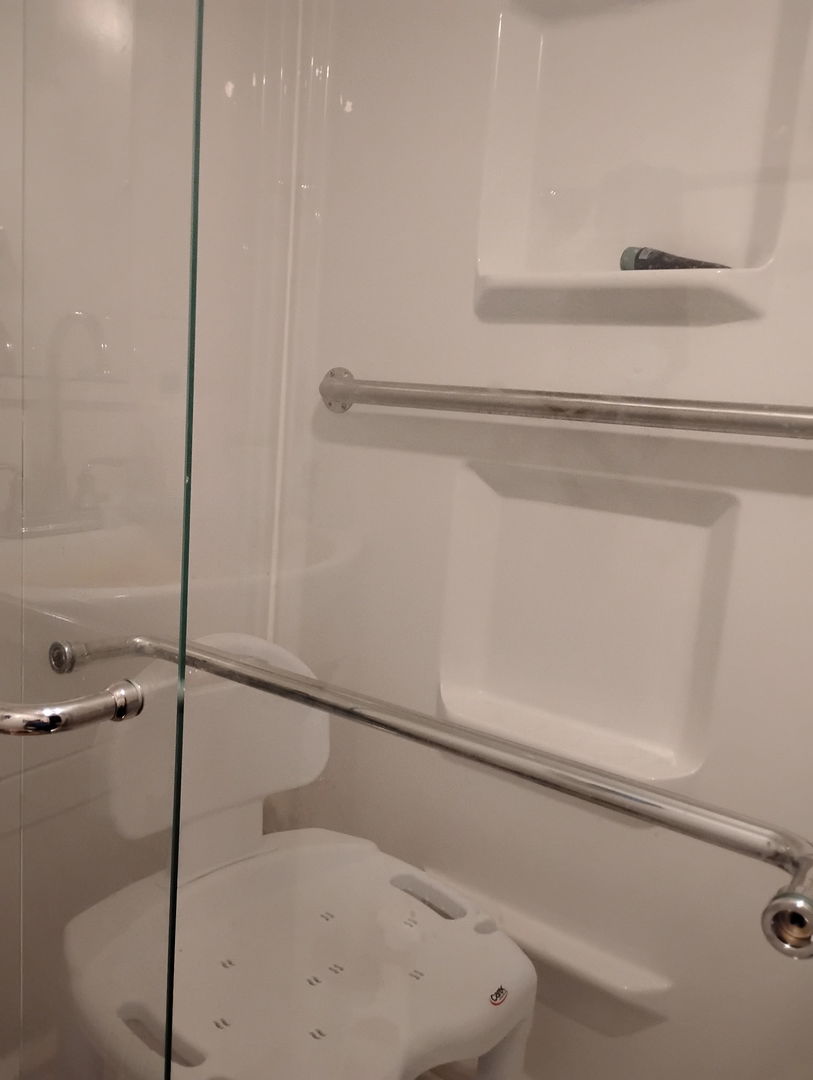 1223 West Dundee Road Palatine, IL 60067 - Photo 4 of 4 a bathroom with a shower and a bath tub