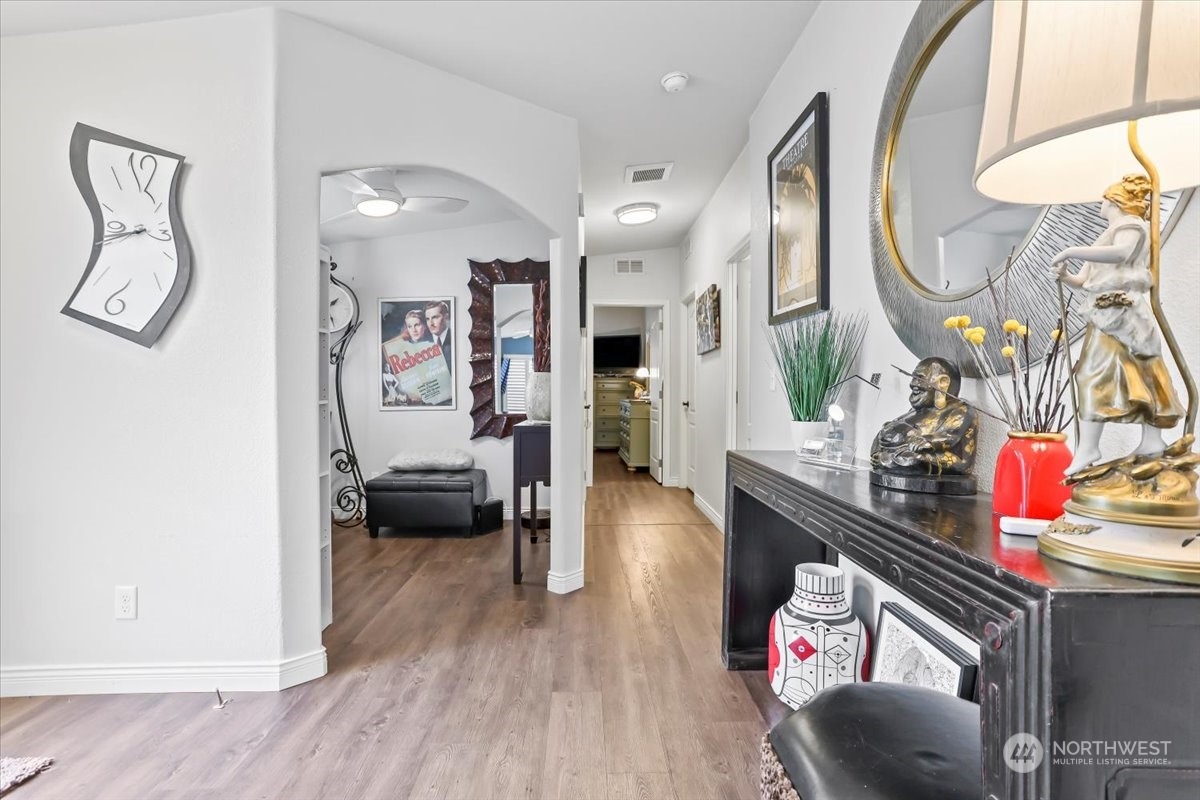 23825 15th Avenue Southeast, Unit 6 Bothell, WA 98021 - Photo 12 of 30 a living room with furniture and a wooden floor
