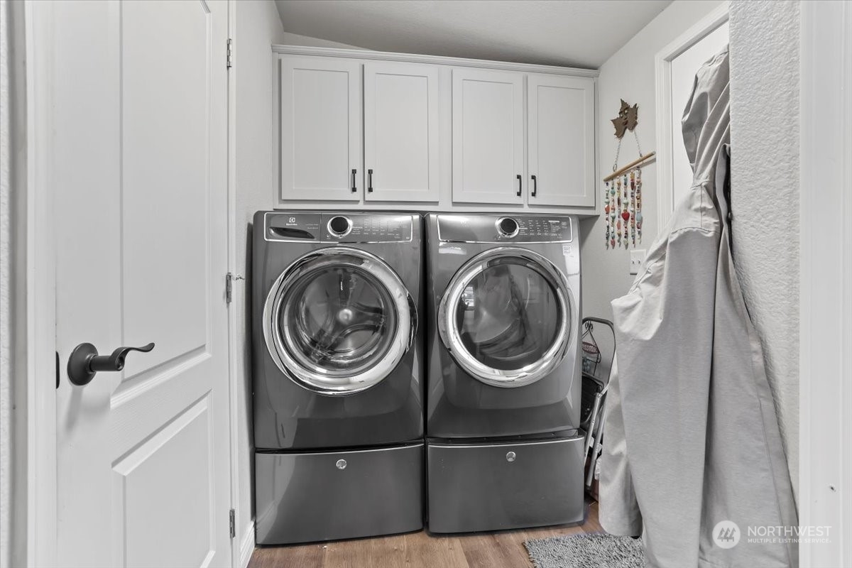 23825 15th Avenue Southeast, Unit 6 Bothell, WA 98021 - Photo 20 of 30 a utility room with dryer and washer