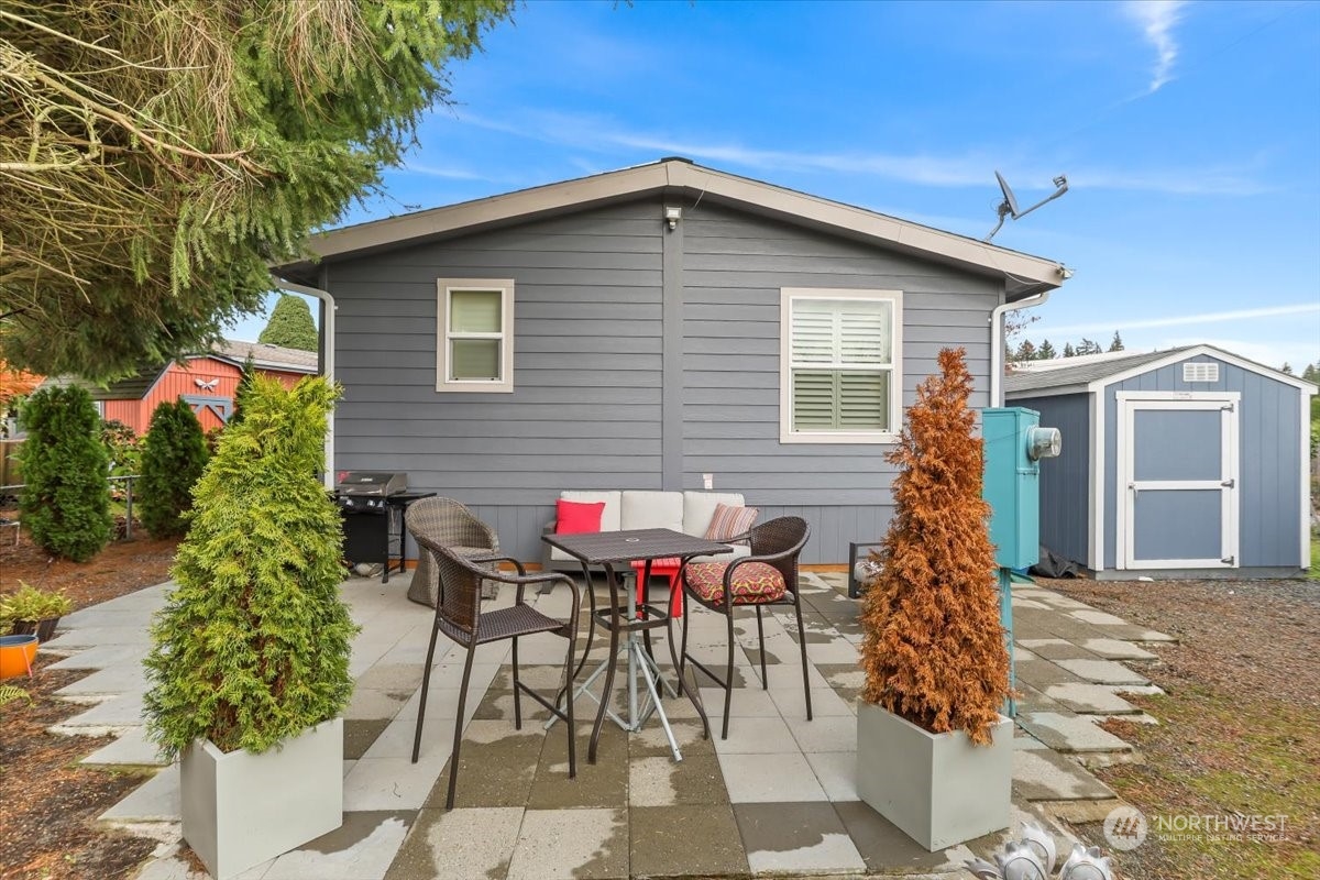 23825 15th Avenue Southeast, Unit 6 Bothell, WA 98021 - Photo 30 of 30 a view of a house with patio