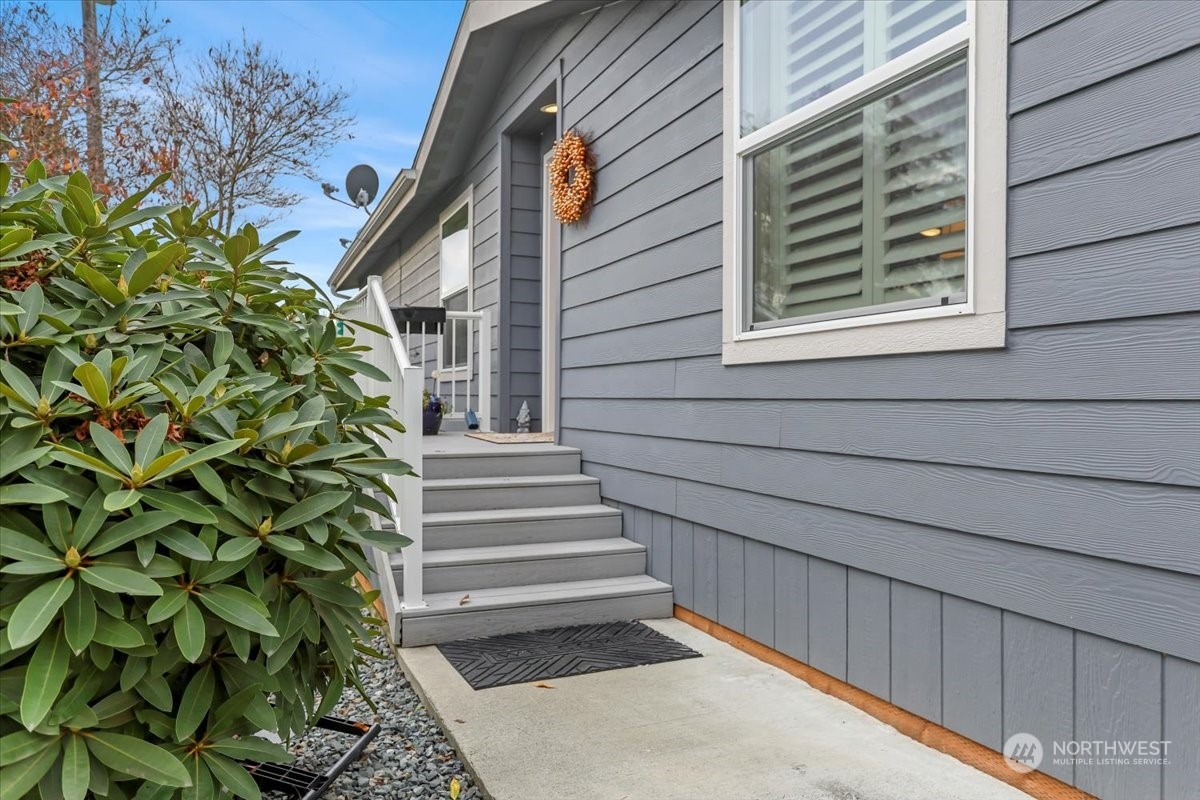 23825 15th Avenue Southeast, Unit 6 Bothell, WA 98021 - Photo 5 of 30 a view of a house with a yard