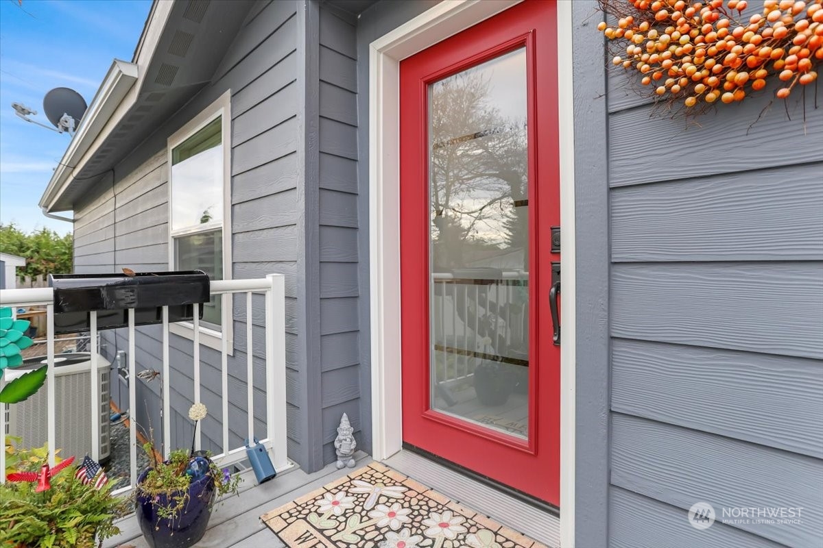 23825 15th Avenue Southeast, Unit 6 Bothell, WA 98021 - Photo 6 of 30 a view of a balcony with a potted plant