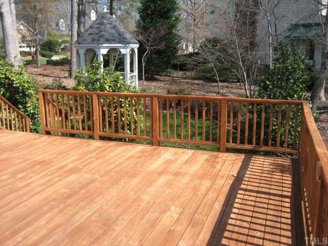 7928 Rooksley Court Raleigh, NC 27615 - Photo 6 of 12 Oversized deck begs for family and friends to enjoy a cookout! Deck was power washed and sealed fall 2008. Patio/Deck