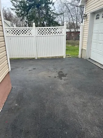 a view of a deck with a yard