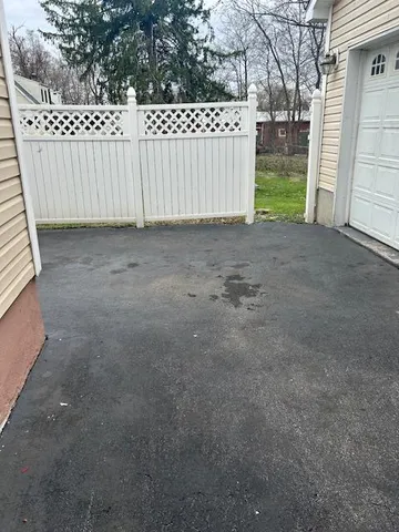 a view of a deck with a yard