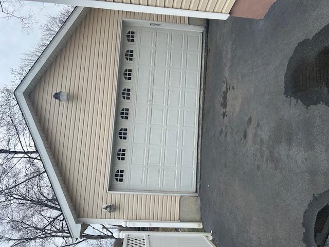 9 Lawrence Road Poughkeepsie, NY 12601 - Photo 3 of 7 a front view of a house with garage