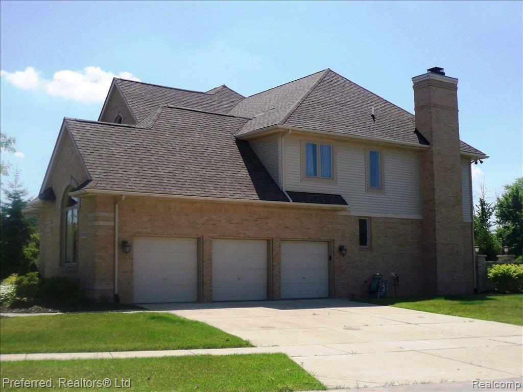 47891 Gladstone Road Canton, MI 48188 - Photo 8 of 17 Side view with 3 car garage