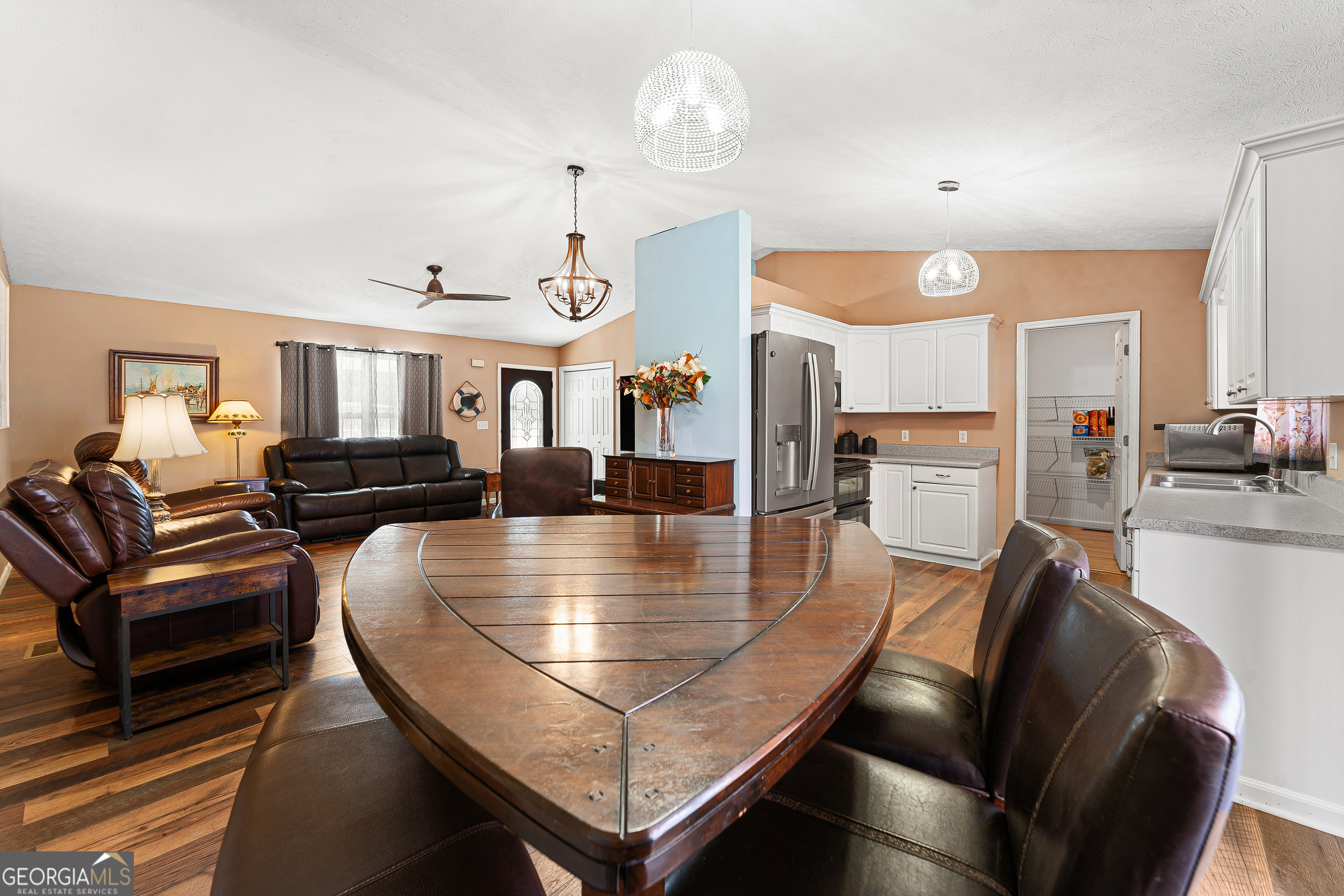 281 Cherokee Drive Fair Play, SC 29643 - Photo 11 of 29 a living room with fireplace furniture and a view of kitchen