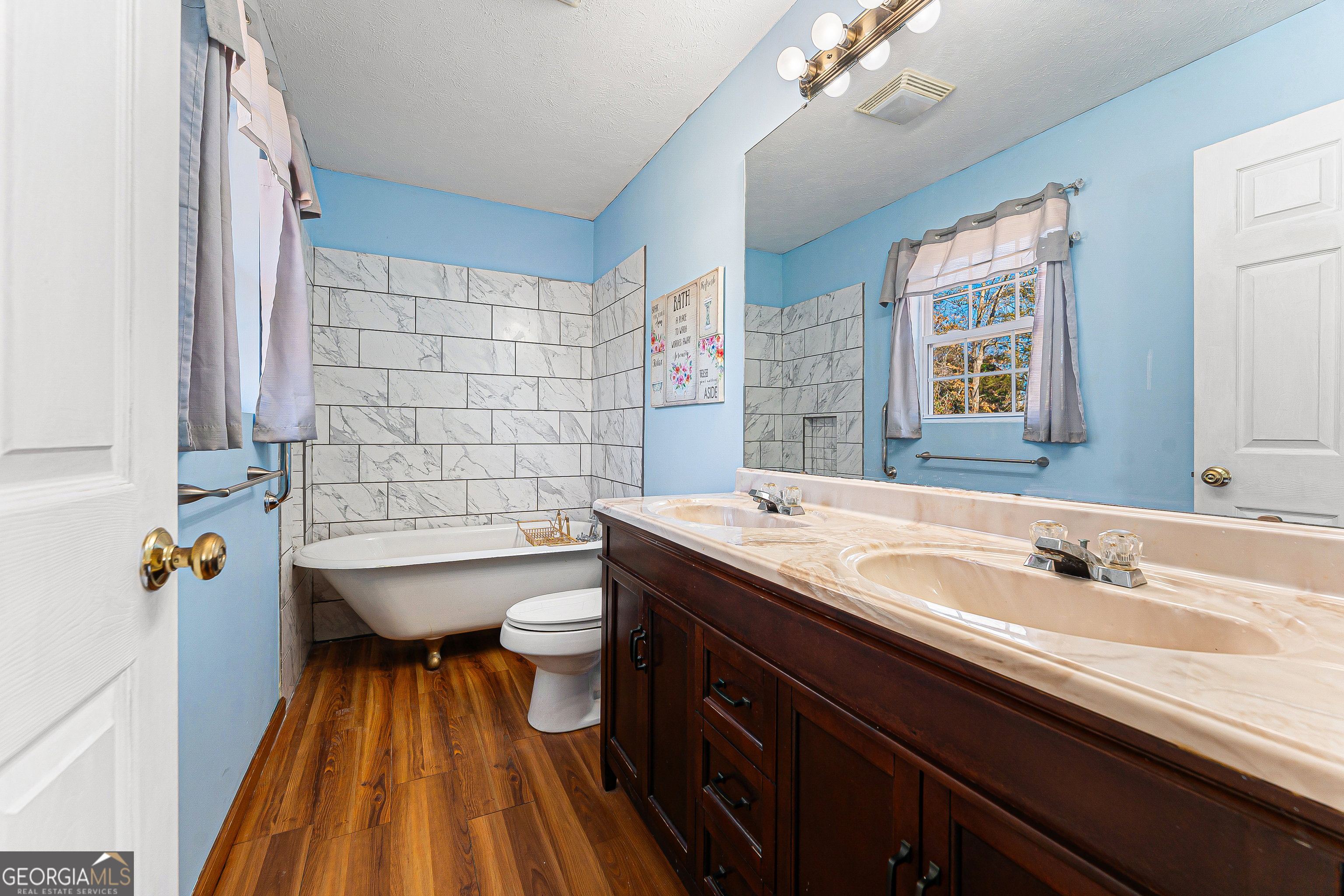 281 Cherokee Drive Fair Play, SC 29643 - Photo 14 of 29 a bathroom with a sink a toilet and shower