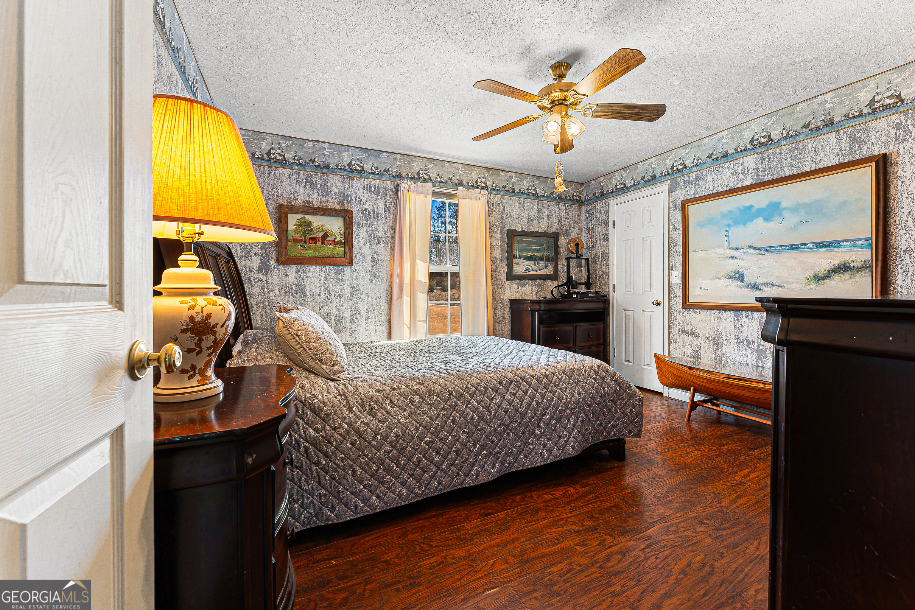 281 Cherokee Drive Fair Play, SC 29643 - Photo 15 of 29 a bedroom with a bed and wooden floor