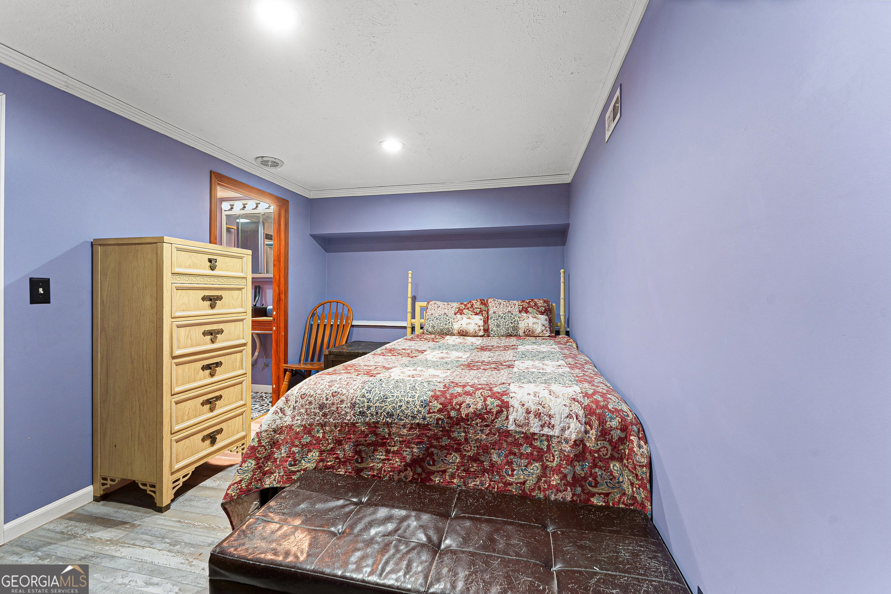 281 Cherokee Drive Fair Play, SC 29643 - Photo 19 of 29 a bedroom with a bed and a walk in closet