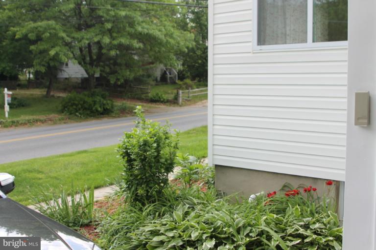 8209 Oakleigh Road Baltimore, MD 21234 - Photo 25 of 27 a view of a backyard with plants
