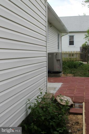 8209 Oakleigh Road Baltimore, MD 21234 - Photo 27 of 27 a backyard of a house with lots of green space