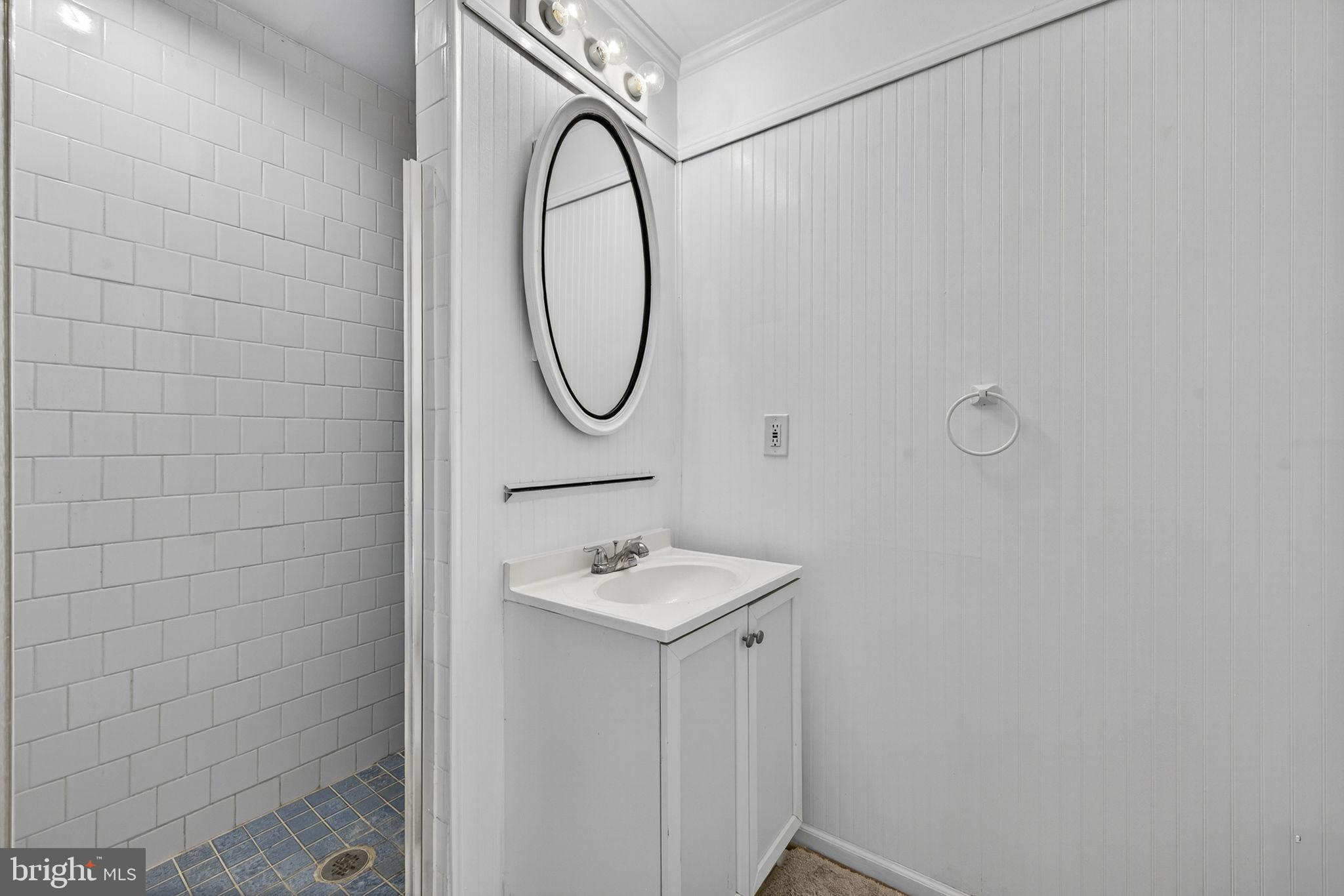 10600 Vantage Court Potomac, MD 20854 - Photo 44 of 91 a bathroom with a sink and a mirror