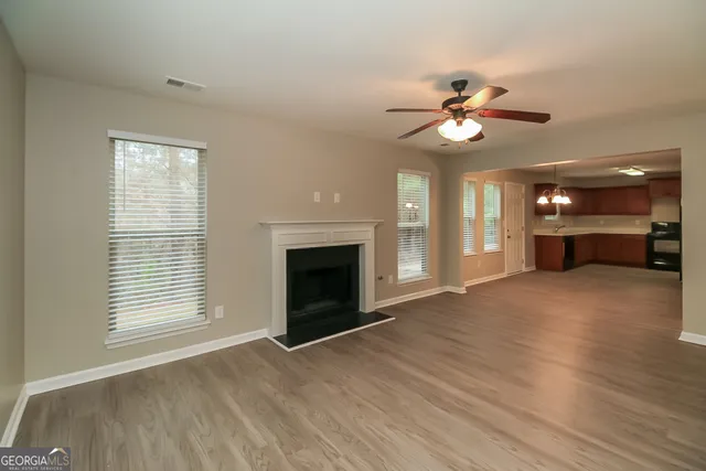 a view of livingroom window fireplace
