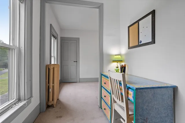 a view of hallway with stairs