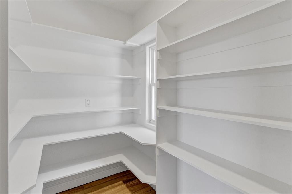 3031 Powell Cemetery Road Tolar, TX 76476 - Photo 19 of 40 a storage room with empty racks