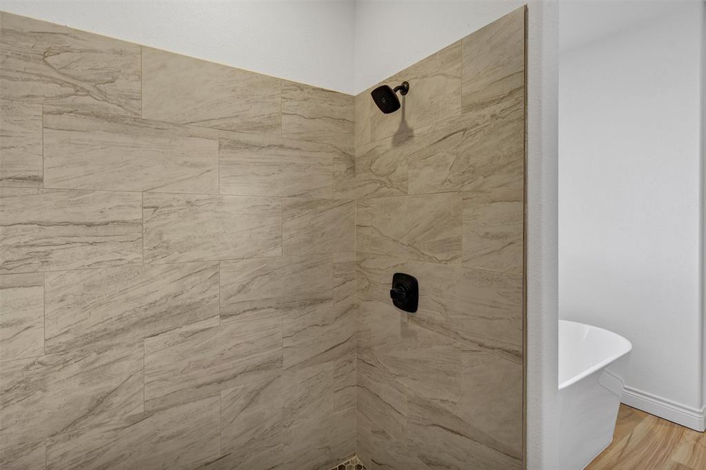 3031 Powell Cemetery Road Tolar, TX 76476 - Photo 28 of 40 a bathroom with a shower