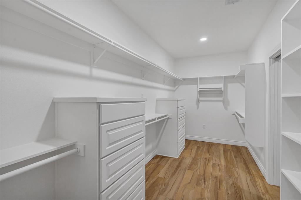 3031 Powell Cemetery Road Tolar, TX 76476 - Photo 29 of 40 a view of walk in closet with empty racks