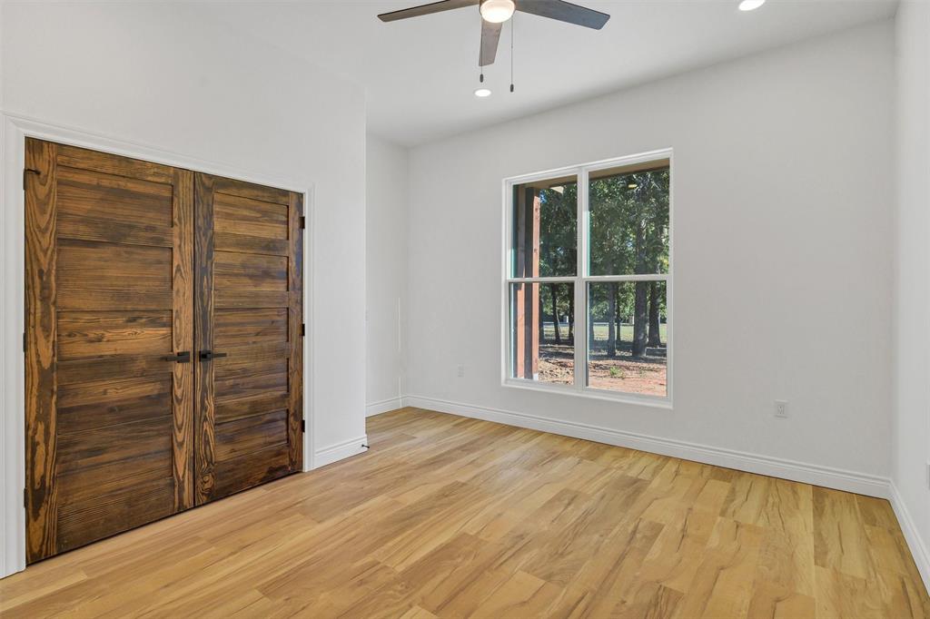 3031 Powell Cemetery Road Tolar, TX 76476 - Photo 32 of 40 a view of an empty room with a window