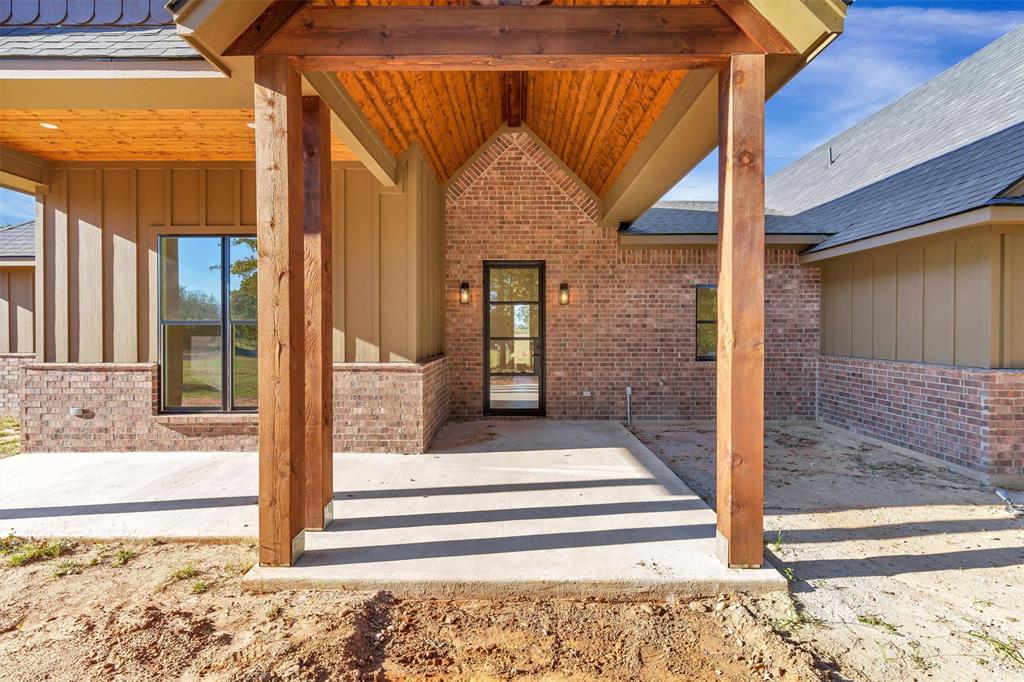 3031 Powell Cemetery Road Tolar, TX 76476 - Photo 6 of 40 a front view of a house