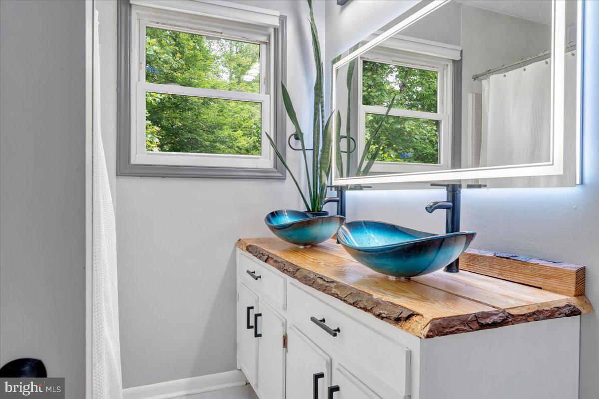 722 Foley Ridge Road Stuart, VA 24171 - Photo 29 of 67 Serene bathroom with natural light.