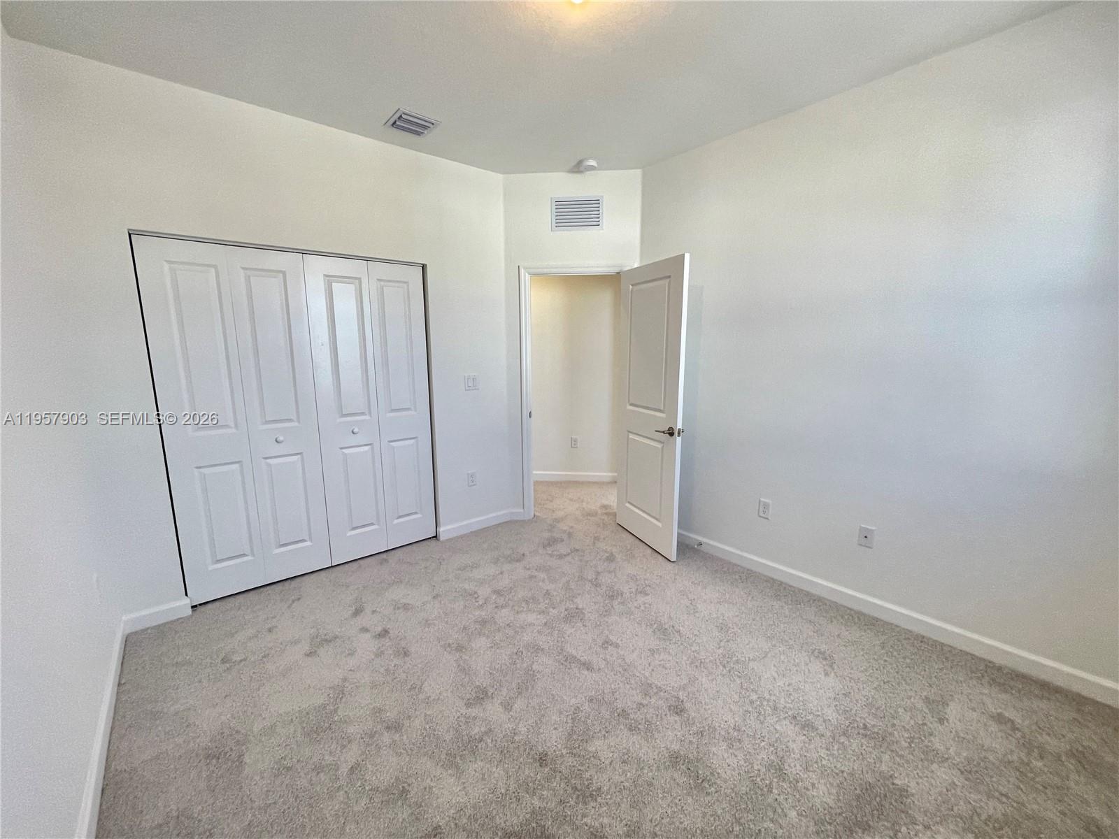 23110 Southwest 129th Place, Unit 23110 Miami, FL 33177 - Photo 20 of 29 a view of an empty room