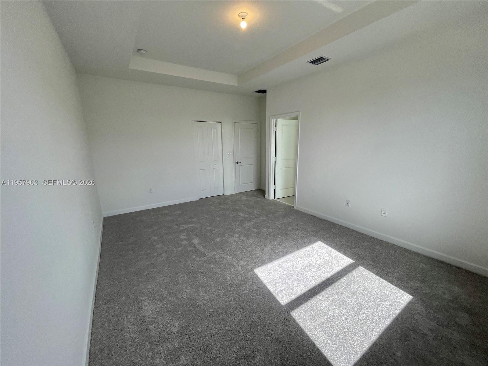 23110 Southwest 129th Place, Unit 23110 Miami, FL 33177 - Photo 25 of 29 an empty room with an empty space
