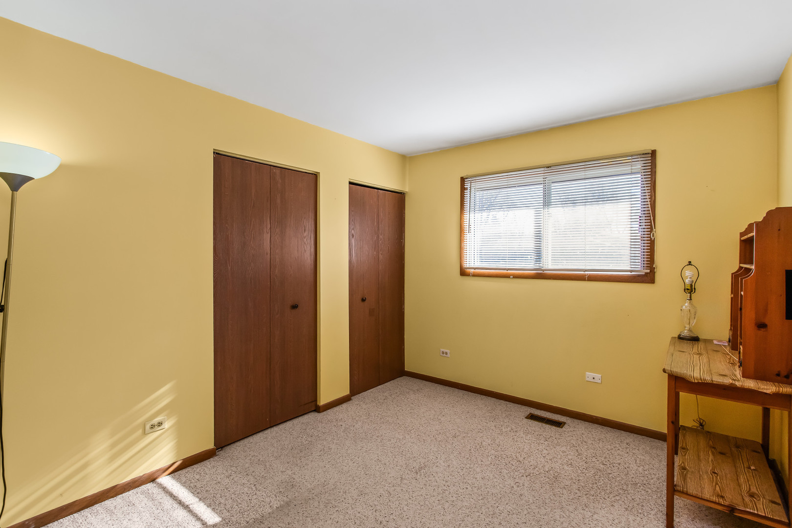 134 Virginia Court Streamwood, IL 60107 - Photo 11 of 25 a view of an empty room with a window
