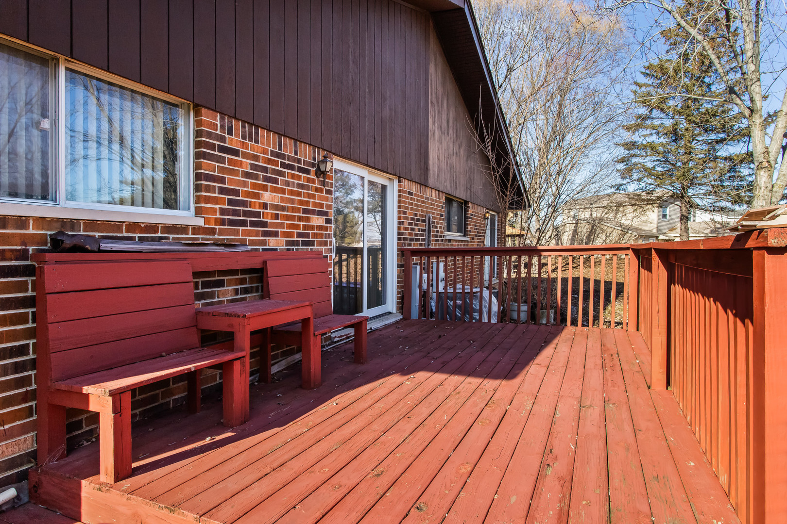 134 Virginia Court Streamwood, IL 60107 - Photo 15 of 25 a balcony with wooden floor and furniture