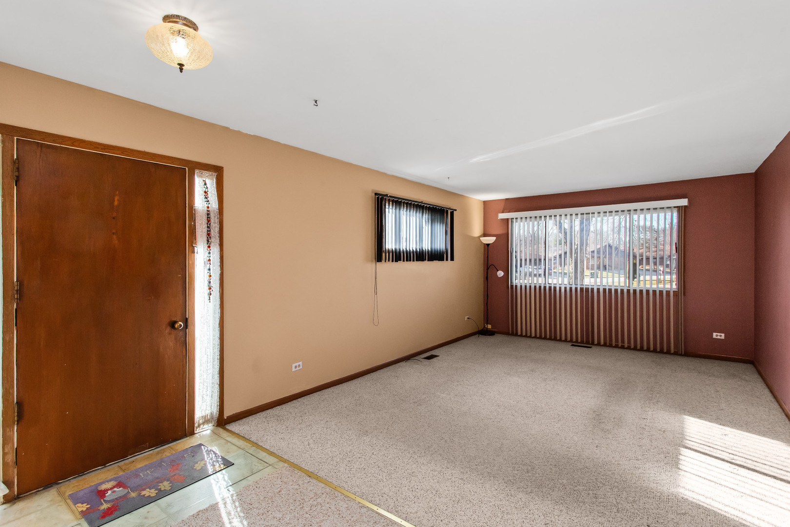 134 Virginia Court Streamwood, IL 60107 - Photo 2 of 25 an empty room with windows