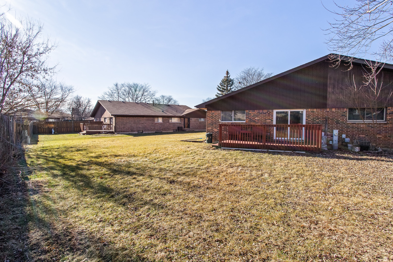 134 Virginia Court Streamwood, IL 60107 - Photo 22 of 25 a front view of a house with a yard
