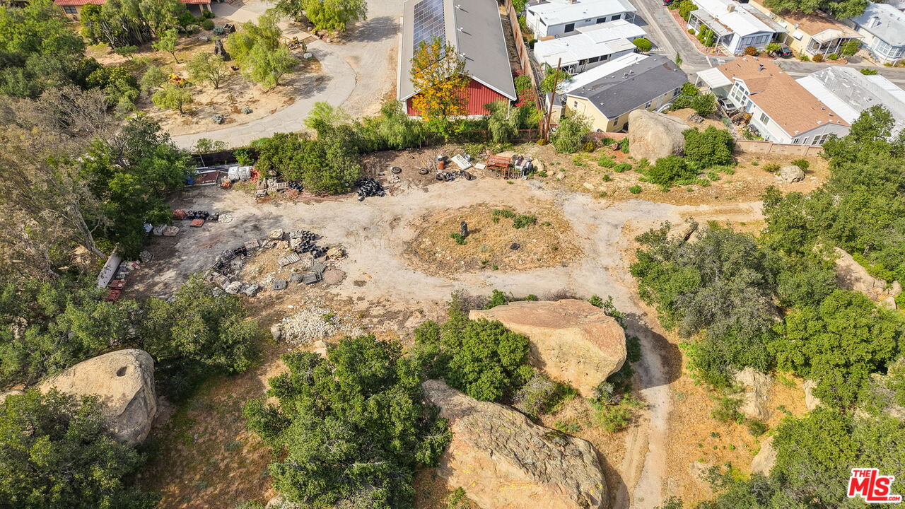 22001 Santa Susana Pass Road Chatsworth, CA 91311 - Photo 11 of 13 a view of a yard with plants