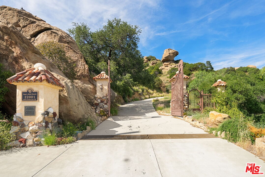 22001 Santa Susana Pass Road Chatsworth, CA 91311 - Photo 13 of 13 a view of a pathway both side of house