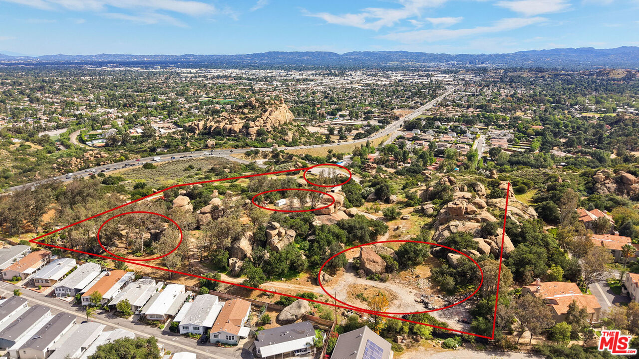 22001 Santa Susana Pass Road Chatsworth, CA 91311 - Photo 2 of 13 an aerial view of residential houses with outdoor space