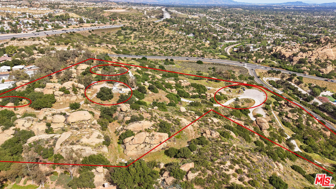 22001 Santa Susana Pass Road Chatsworth, CA 91311 - Photo 4 of 13 an aerial view of residential houses with city view
